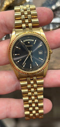 Pulsar Men's Gold Tone Black
Dial Dress Watch 762149